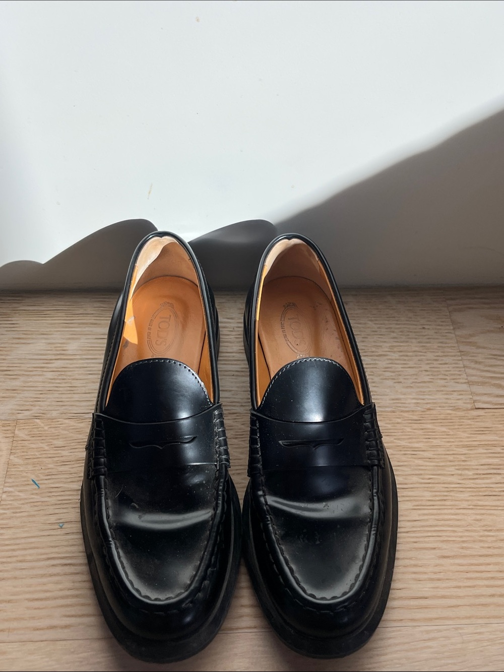 Tod's Black Leather Penny Loafers
